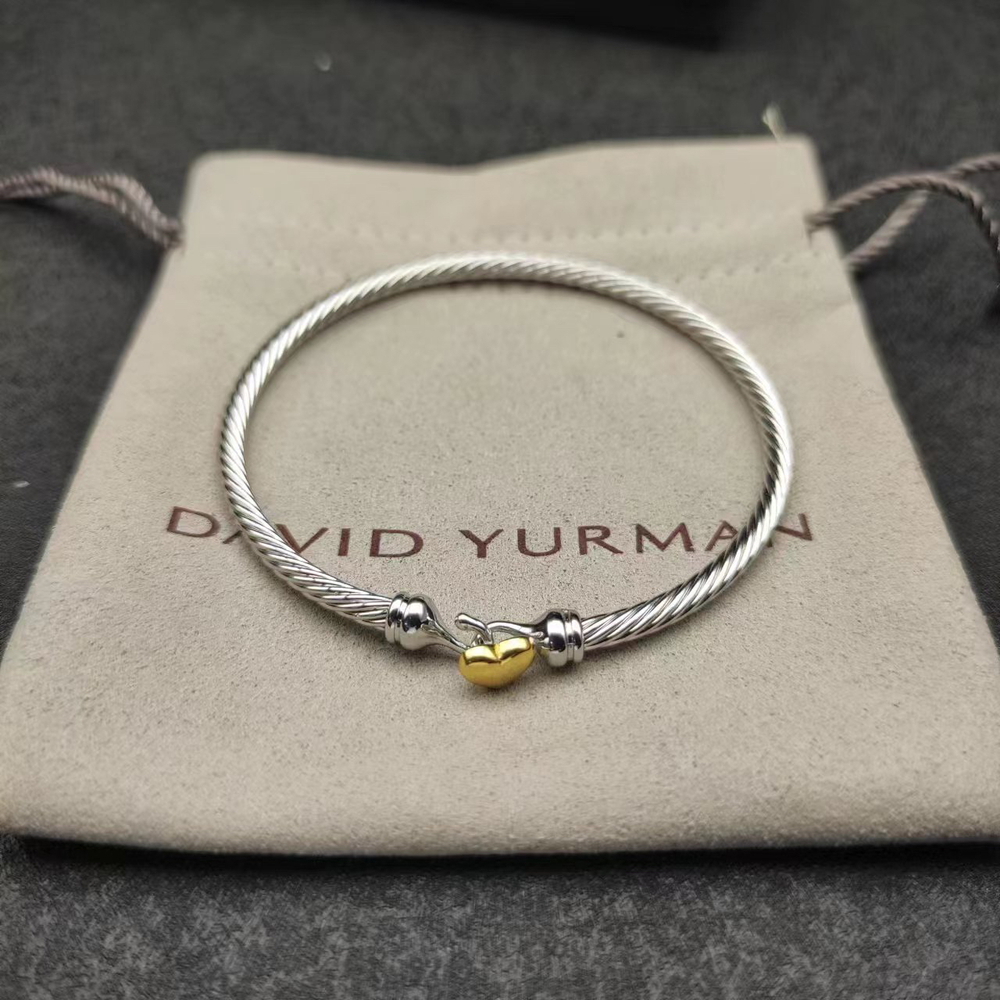 David Yurman's gold heart-shaped silver bracelet - Picture 1 of 9